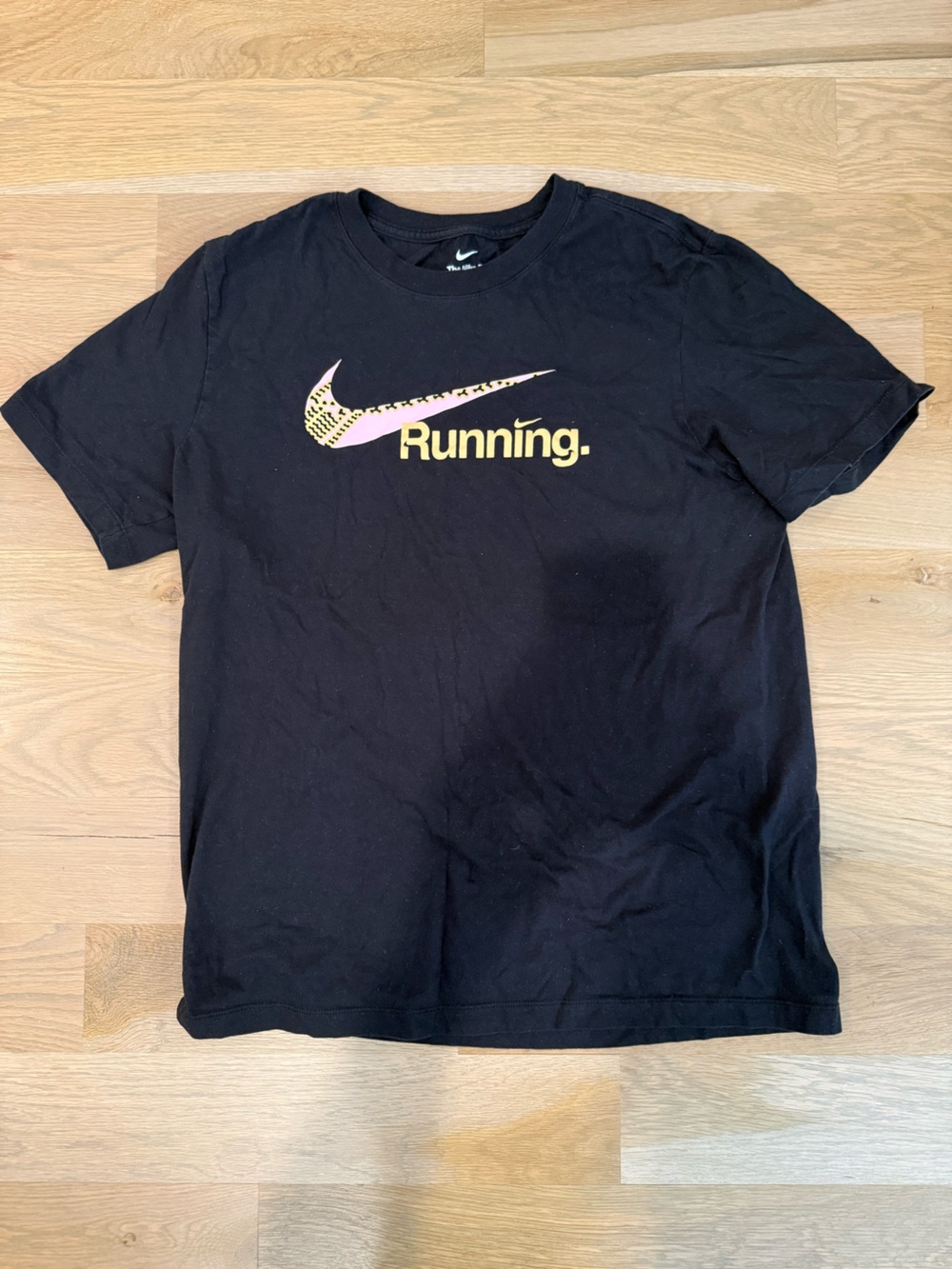 Nike Black Tee with Yellow 'Running' and Leopard Swoosh